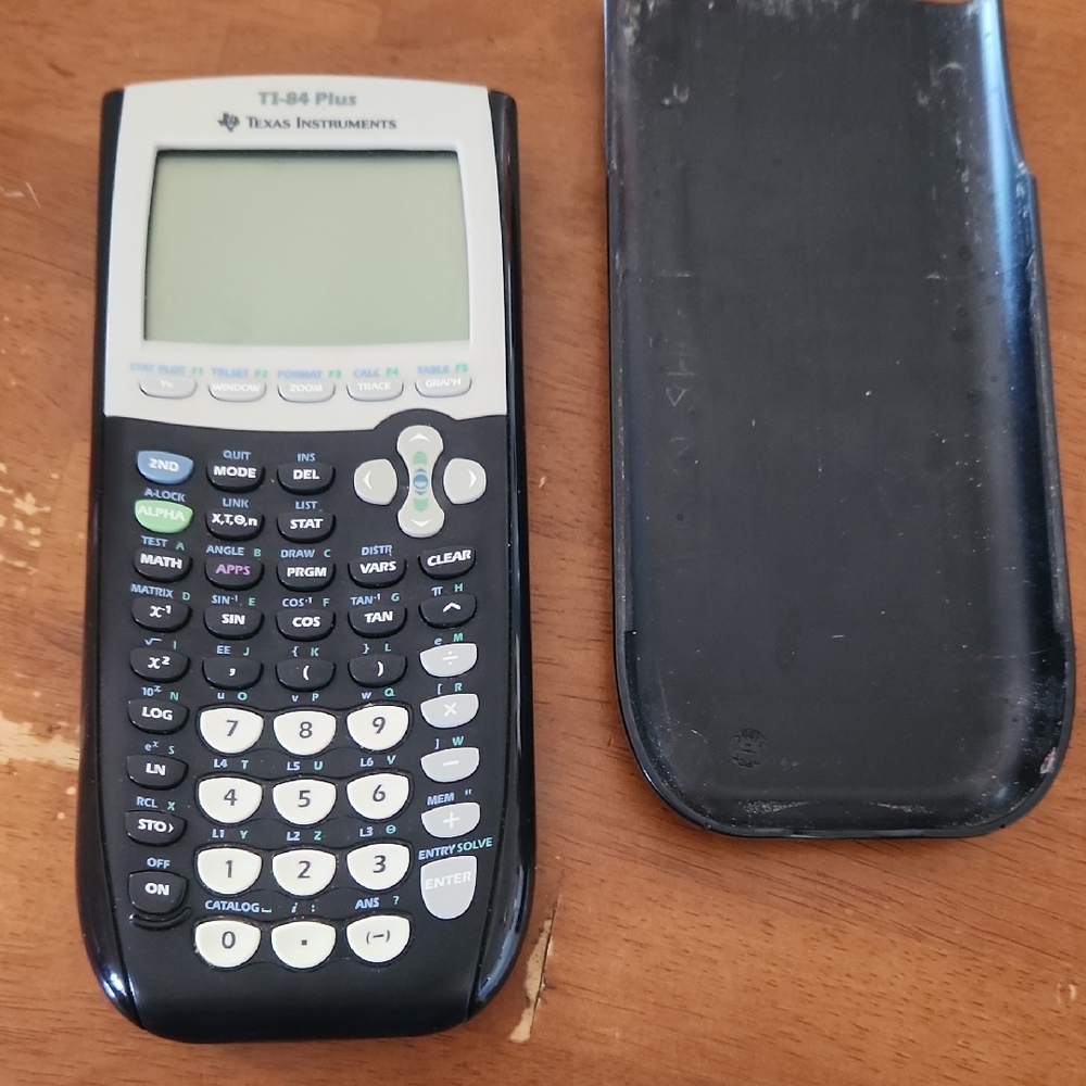 Texas Instruments TI-84 Plus Graphing Calculator - Black and White